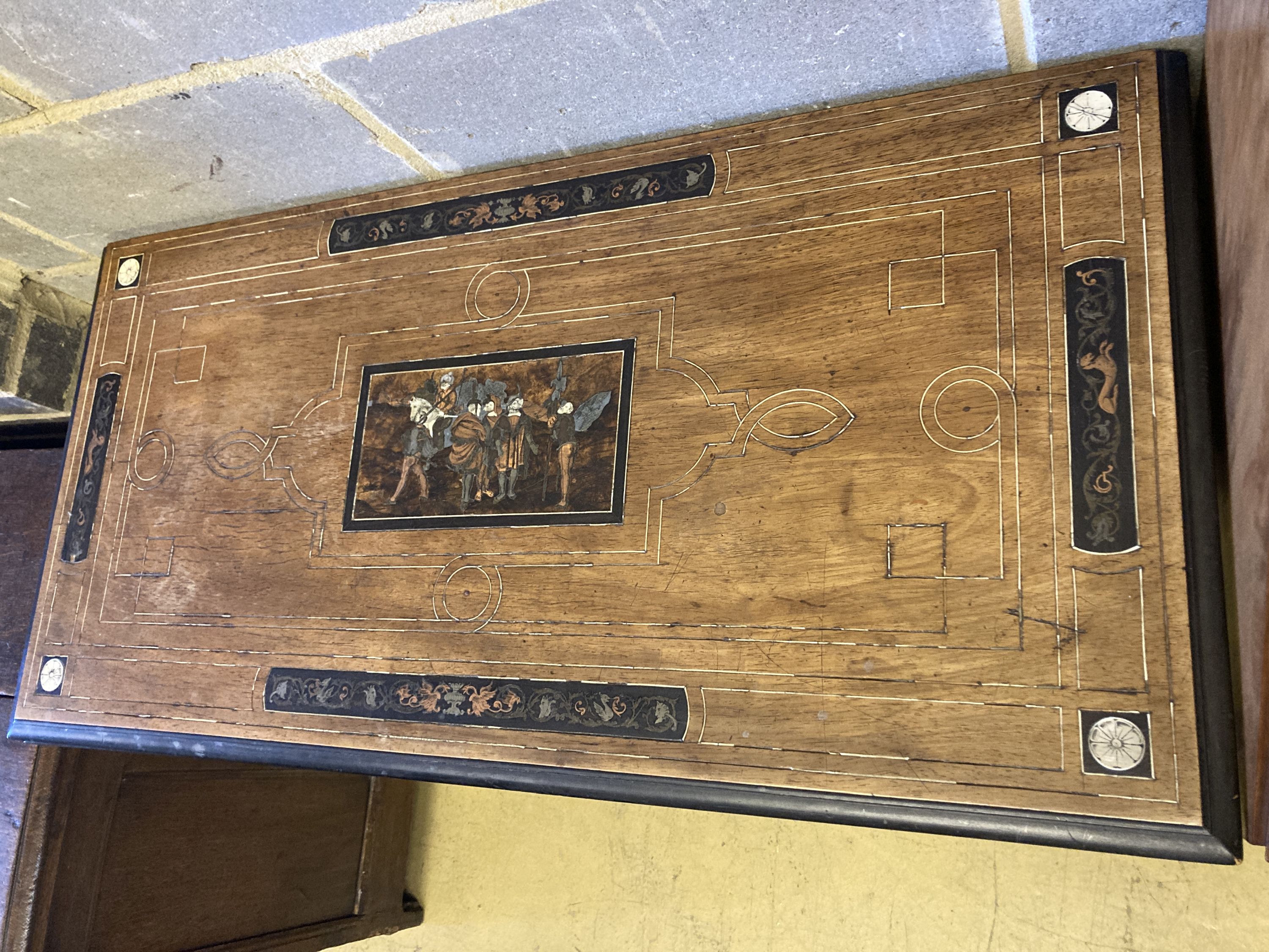 A 19th century Italian inlaid walnut and ebonised card table with folding top (faults), width 94cm, depth 47cm, height 75cm